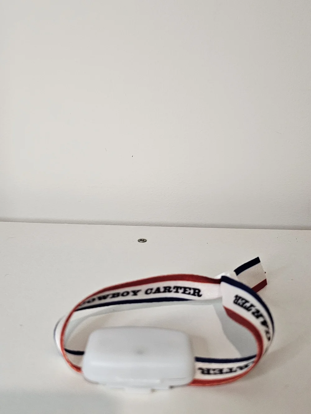 White Wireless Earbuds with Red, White & Blue Strap